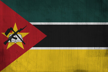 Patriotic wooden background in color of Mozambique flag