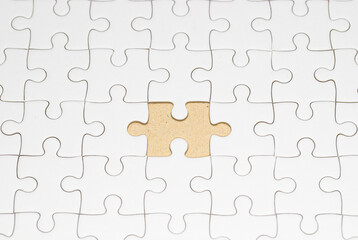 Missing piece of white jigsaw on the white background.