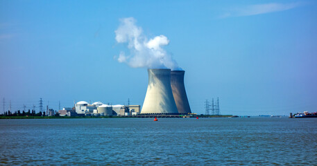 Harbour of Antwerp, Belgium with nuclear power plant 