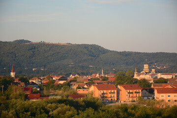 Fototapeta na wymiar Caransebes, Romania - September 13, 2021: City view from above in early morning