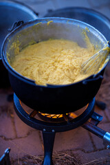 a large vessel in which a polenta is prepared