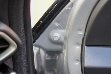 Interior panel fittings of a new silver vehicle