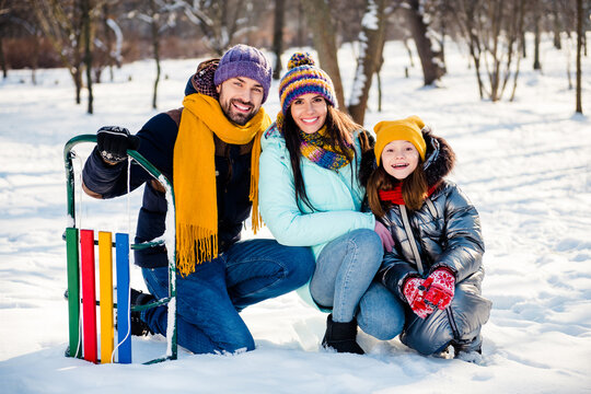 Full size photo of happy cheerful smiling good mood family having fun outside outdoors enjoying winter vacation