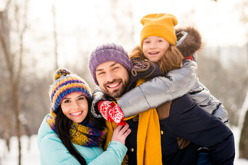 Photo of attractive family happy positive smile daughter piggyback parents happy positive smile outdoors