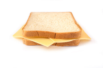 toast bread with hard cheese on a white plate.