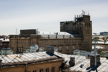 view from the roof of an old gray industrial building