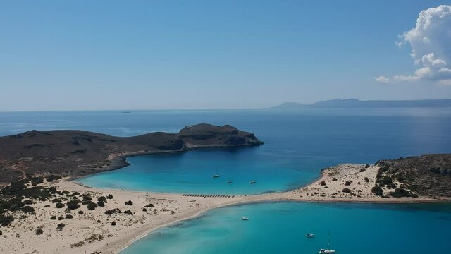 Aerial view of Simos beach in Elafonisos island in Greece. Elafonisos is a small Greek island the Peloponnese with idyllic exotic beaches and crystal clear waters. Laconia, Greece, Europe