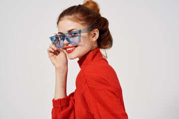 portrait of a woman in a red sweater Lifestyle Studio fun model