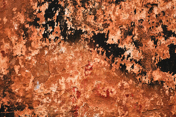 Old ruin wall with peeling paint