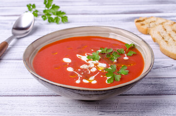 Red puree soup with cream