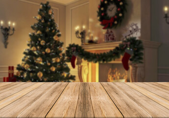 Wooden board empty table top on of blurred background. Christmas concept