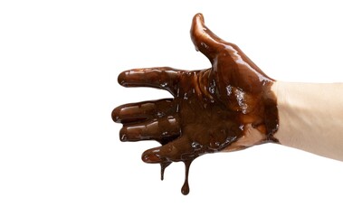 An open male hand dripping and spilling molten chocolate, white background