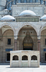 Shot of the north facade with the forecourt and the central fountain of Suleymaniye Mosque © Turgay Koca/Wirestock