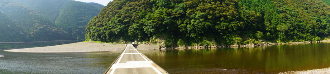 Fototapeta na wymiar Panoramic view of Shimanto River Valley and Iwama Sinking bridge in Kochi, Shikoku, Japan - 日本 四国 高知 四万十川 岩間沈下橋 パノラマ 