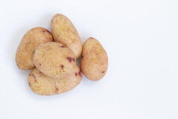 pile of potatoes isolated on white background
