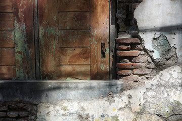 Old brick walls and windows of an abandoned building in the Old city, Semarang                