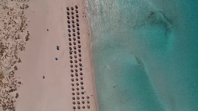 Aerial view of Simos beach in Elafonisos island in Greece. Elafonisos is a small Greek island the Peloponnese with idyllic exotic beaches and crystal clear waters. Laconia, Greece, Europe
