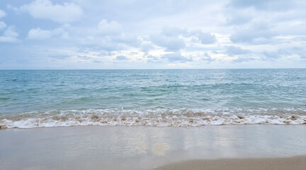 Sand beach and blue sea and blue sky