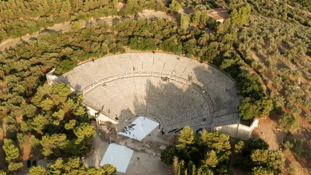 Ancient Theatre Of The Asklepieion On A Sunny Day At Epidaurus In Greece. - aerial