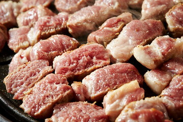 meat on a grill, close up of meat