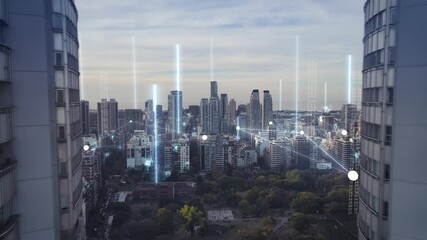 Future concept with glowing digital lines connecting city - Cinematic drone flight between twin skyscraper buildings in Buenos Aires - Modern skyline with high tech data communication -5g 6g network - Powered by Adobe