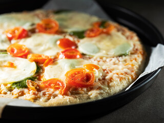 pizza with tomato and mozzarella