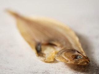 dried flatfish fish on marble