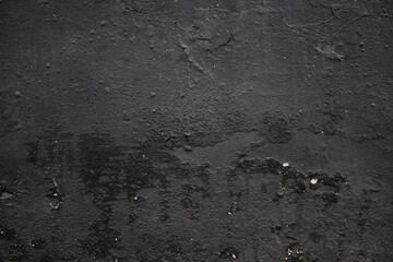 Black plaster wall texture