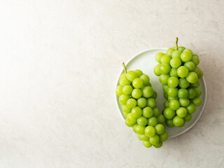 Shine Muscat, green grapes on a plate 