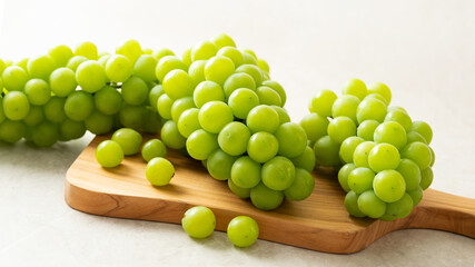 Shine Muscat, Green grapes on a cutting board 