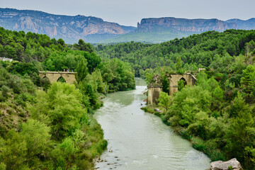 Fototapeta na wymiar Destroyed bridge over the Gallego river, Murillo de Gallego Huesca Aragon