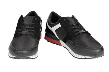 Pair of new non-branded black athletic trainers or trainers isolated on white background. File contains clipping path. Full depth of field.