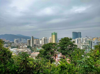 View of residential buildings in Macau. Panorama of the city. High buildings. City skyline