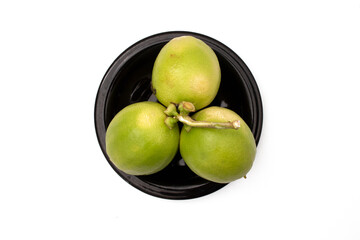 lemons in a plate on a white background