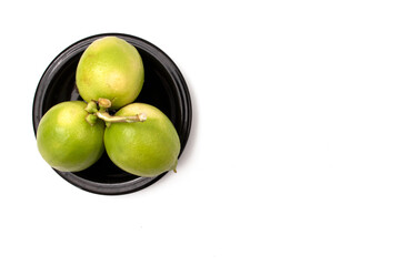 lemons in a plate on a white background