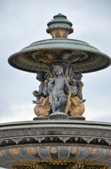 Fototapeta na wymiar Fountain on Place de la Concorde, Paris, France