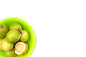 lemons in a plate on a white background