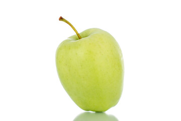 One ripe green apple, close-up, isolated on white.