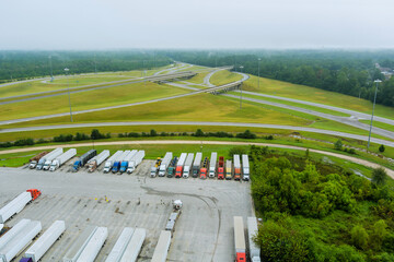 Aerial view of parking lot with trucks on transportation of truck rest area dock