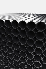 Close-up of metal pipes on a white background. A pile of iron pipes isolated on a white background. 3d render illustration