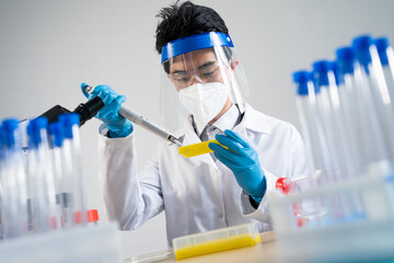 Laboratory assistant conducting experiments for laboratory research.