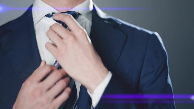 身なりを整えるビジネスマン