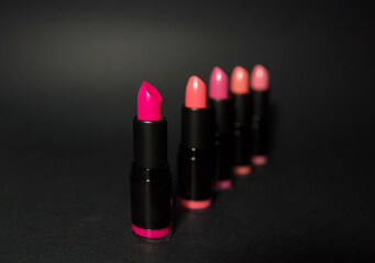 bright lipstick on a black background