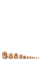 Set of precision weights for a balance scale isolated on white background by descending order.