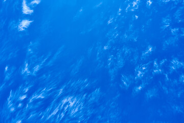 Fototapeta na wymiar Blue sky with streaks of cloud