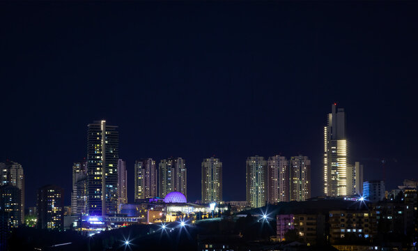 Beautiful cityscape of Ankara at night. Distant photo of Oran district with skyscrapers.. 