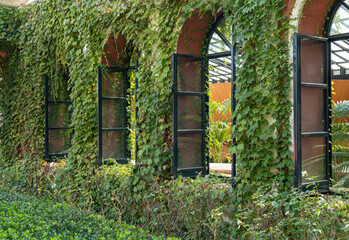 Garden in french style, with some classic decoration.