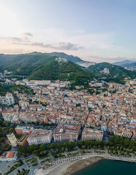 Aerial view of Salerno townscape along the mountain ridge with Arechi castle on top, Salerno, Campania, Italy.