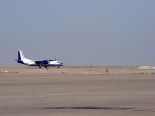Fototapeta na wymiar Aircraft landing at at the international airport in Basra, Iraq, during the war