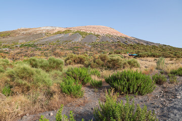 Fototapeta na wymiar Vulcano island (Aeolian archipelago), Lipari Messina, Sicily, Italy, 08.10.2021: view of lava soil of the volcano.